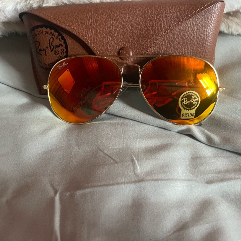 Ray-Ban Gold Frame Sunglasses with Vibrant Orange Lenses